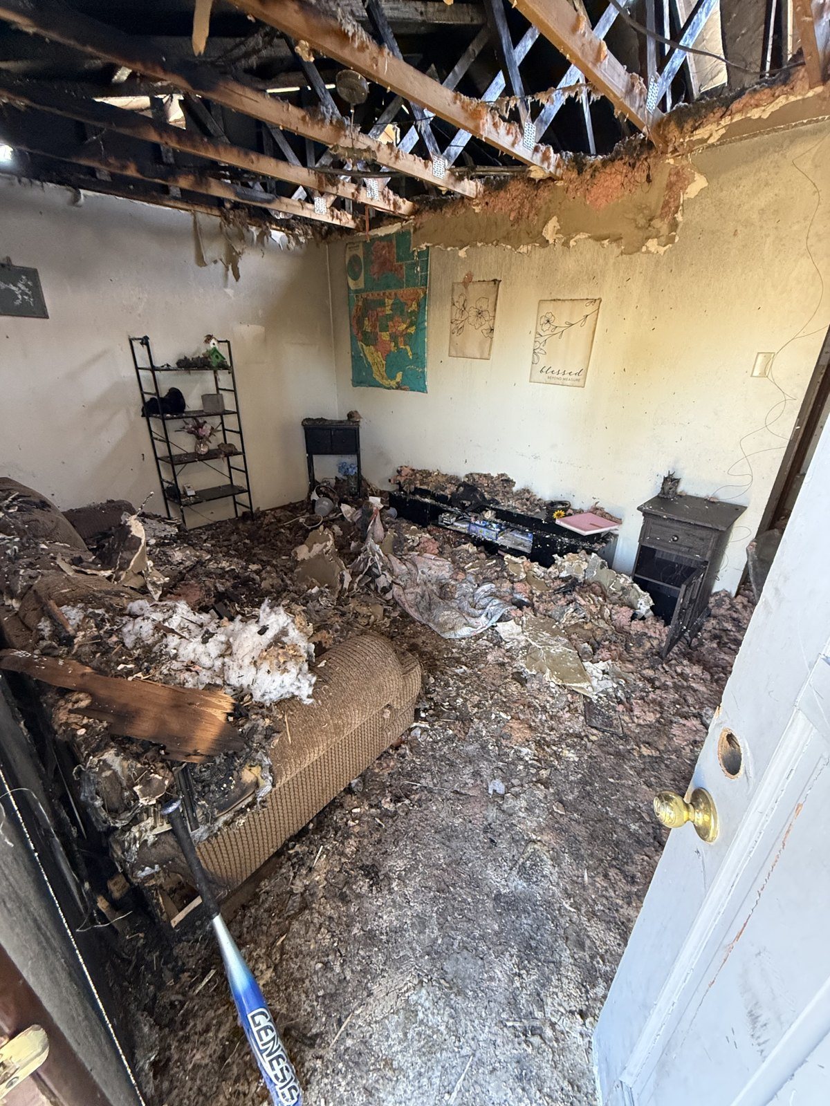Fire and smoke damaged room before a contents pack-out